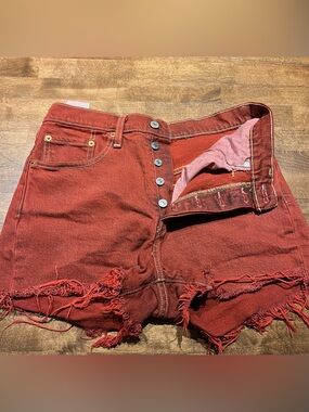 Levi's High-Rise Rust Red Distressed Denim Shorts